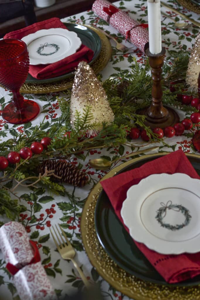 A cottage Christmas tablescape with green, red and gold elements.