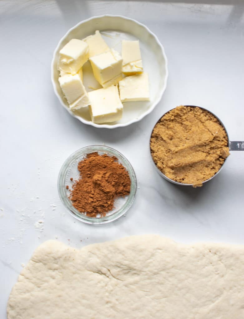 Overhead view of ingredients for cinnamon roll filling
