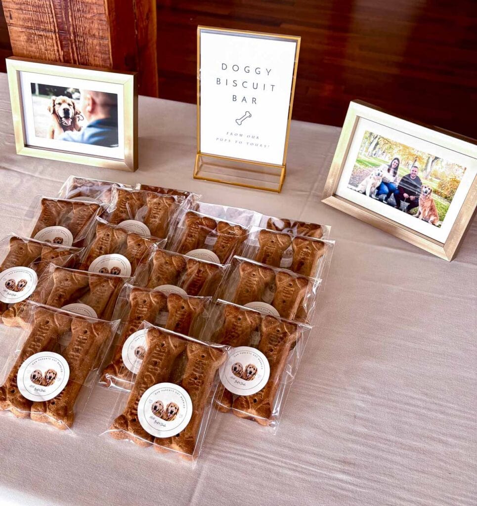 Dog biscuits packaged in cellphone bags for wedding guests to take home for their pups.