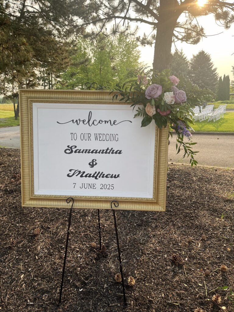 A sign that says welcome to the wedding of Samantha and Matthew