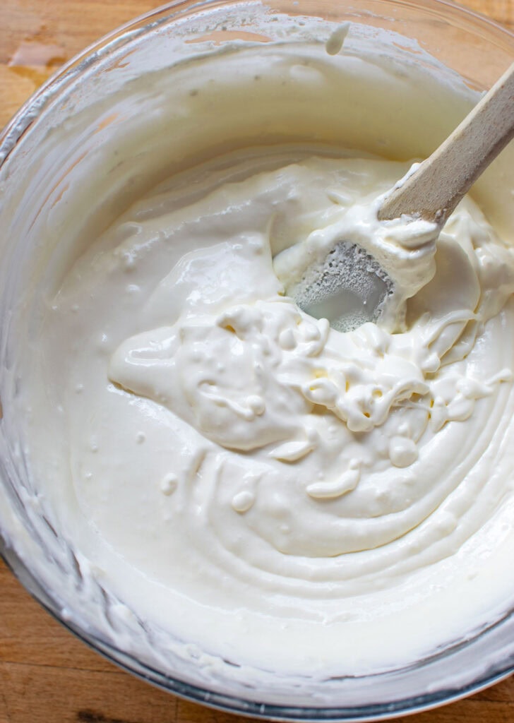 The whipped topping folded into the lemonade mixture with a rubber spatula.