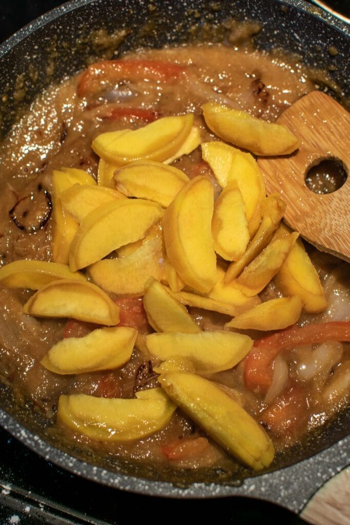 Fresh peach slices added to the peach puree sauces.