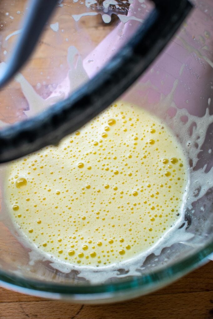 Eggs that have been beaten in a stand mixer for 5 minutes.