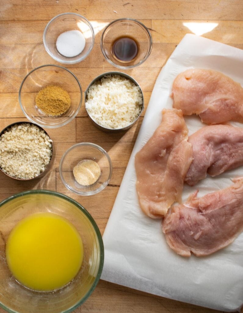 Ingredients to make crispy oven baked parmesan chicken.