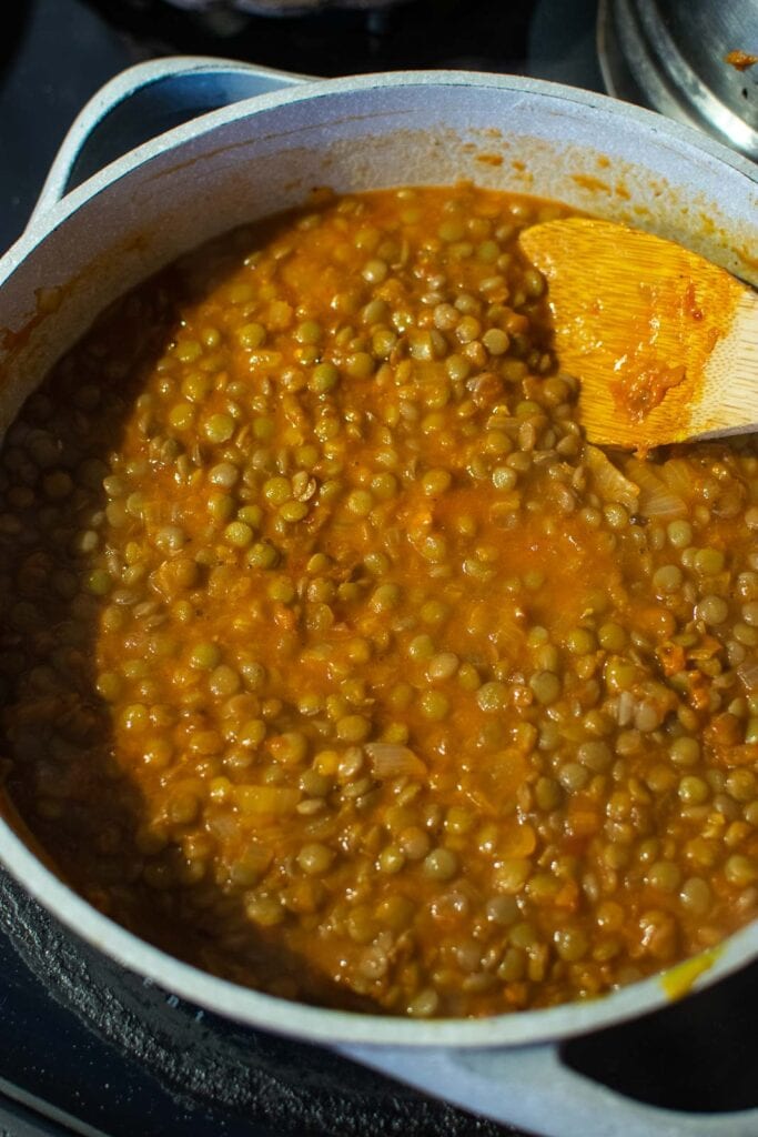 Hot water added to the lentil and Chilli sauce mixture.
