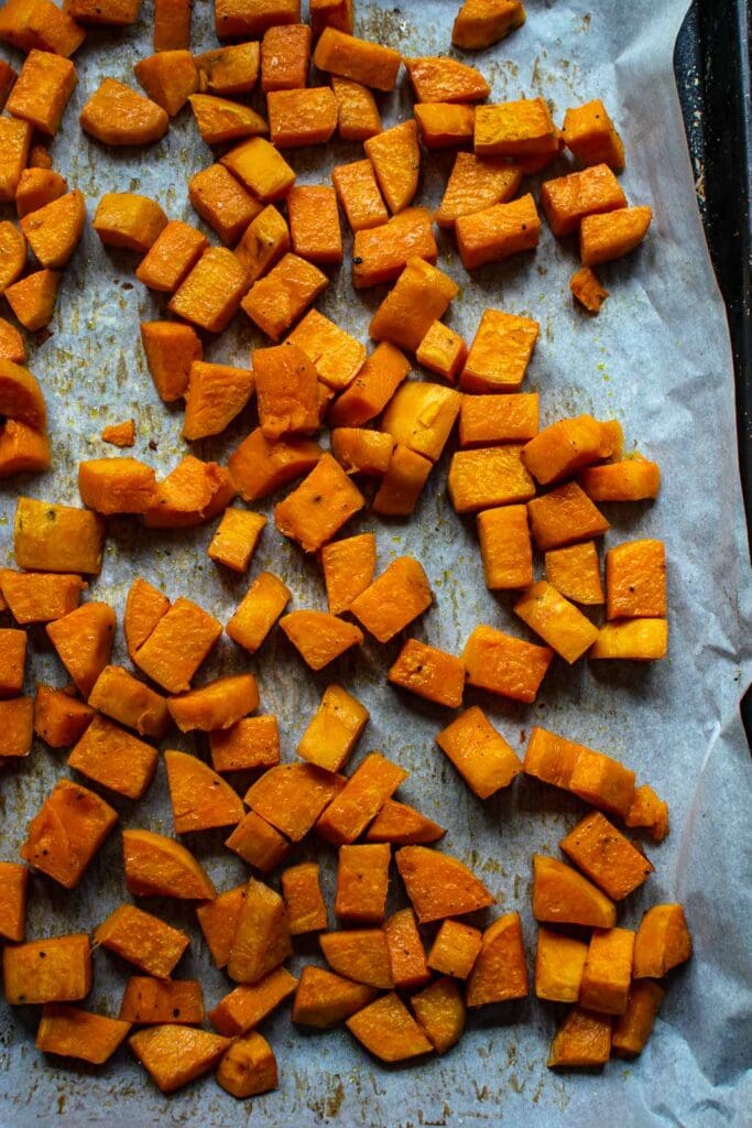 Roasted cubed sweet potatoes fresh out of the oven.