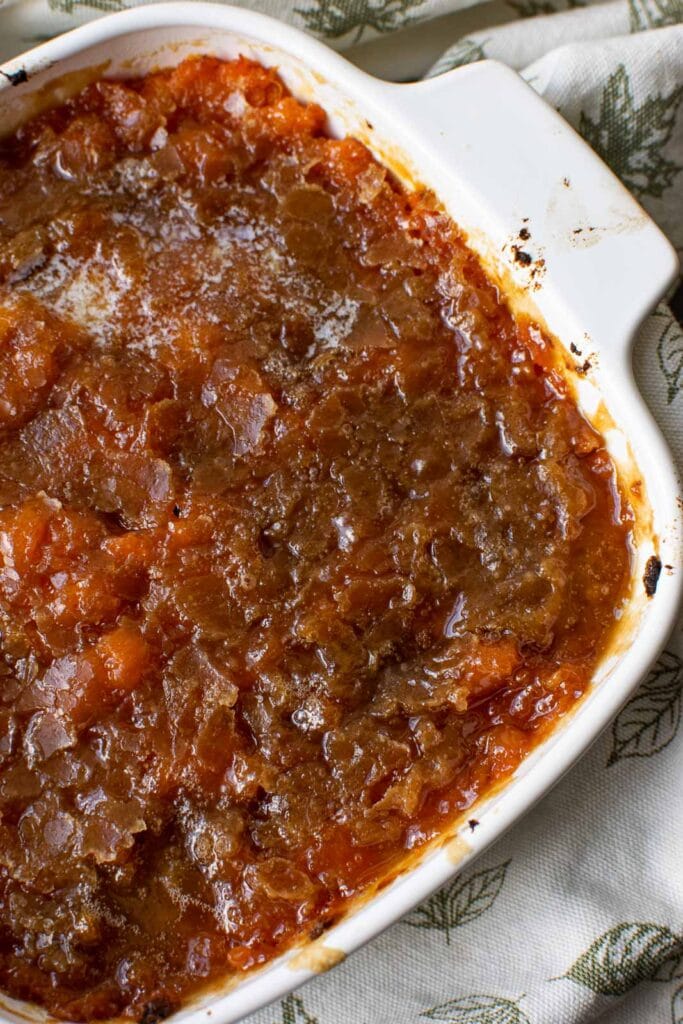 Close up of a casserole dish with a brown sugar sweet potato casserole.