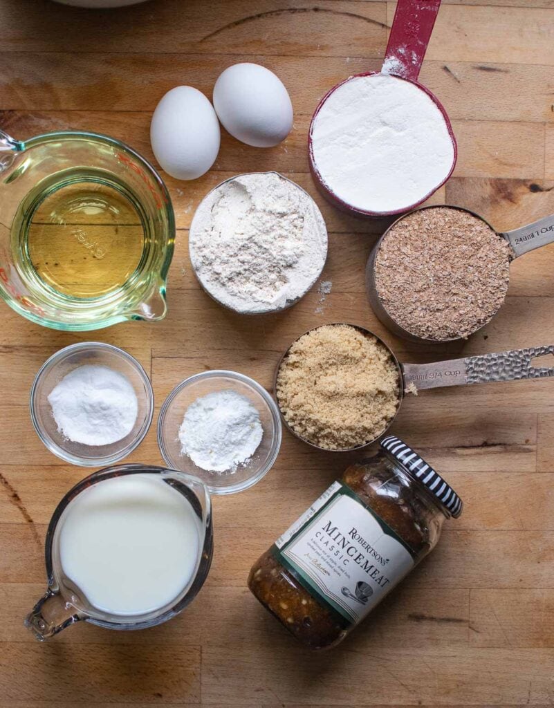 Ingredients to make mincemeat muffins include flour, wheat bran and jarred mincemeat.