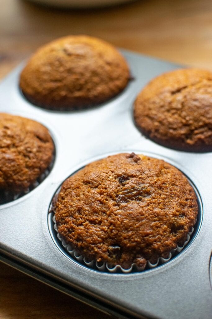 A pan of muffins fresh out of the oven.