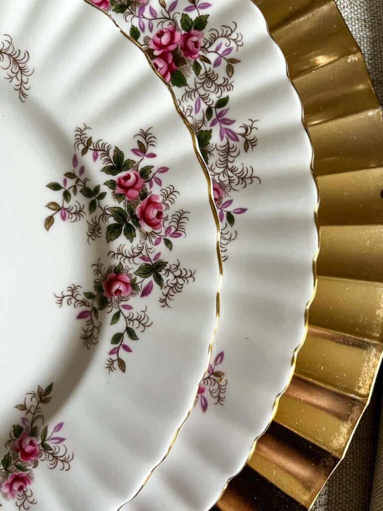 A close up of the Royal Albert china on an elegant Thanksgiving table.