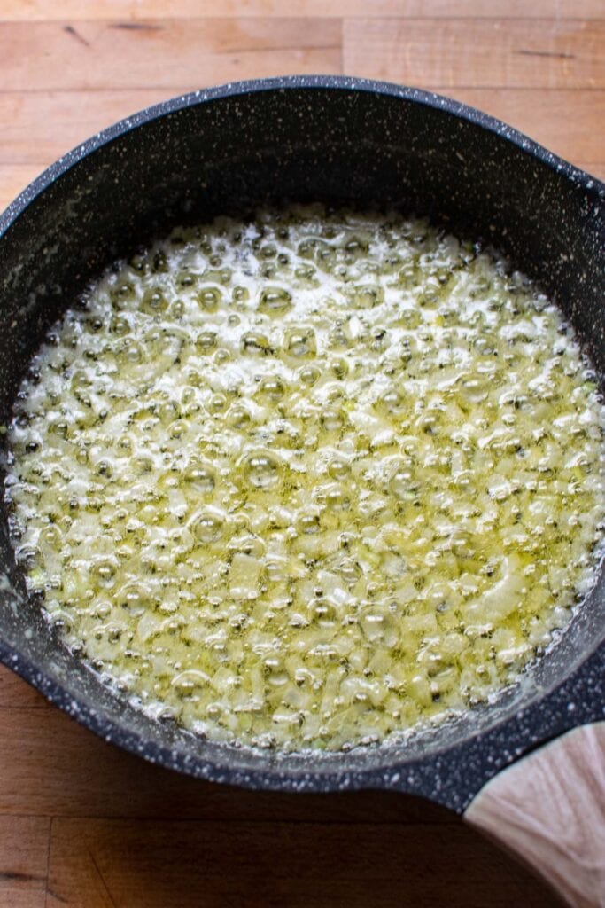 Sizzling butter in cast iron, perfect for skillet cooking.