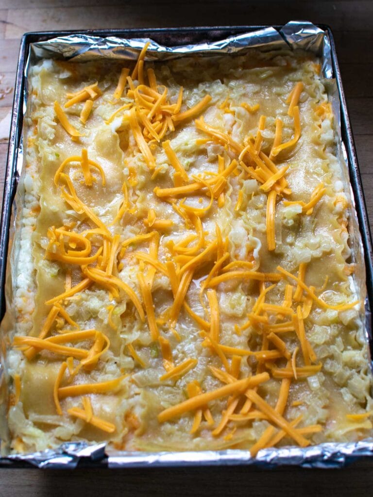 Shredded cheese sprinkled over the top of the casserole before baking.