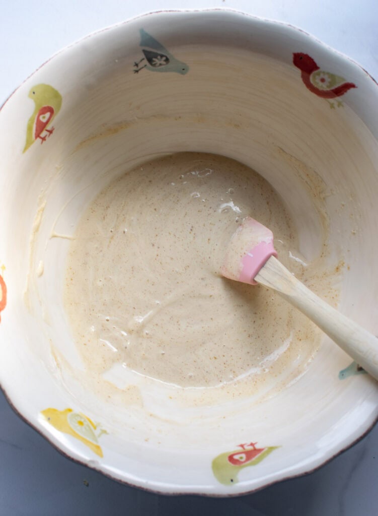 Mayonnaise, brown sugar, lemon juice, vinegar and salt mixed together in a large serving bowl.