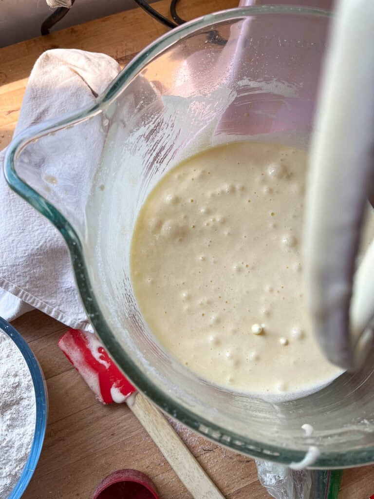 Almond flour and almond extract blended into batter for zucchini bundt cake.