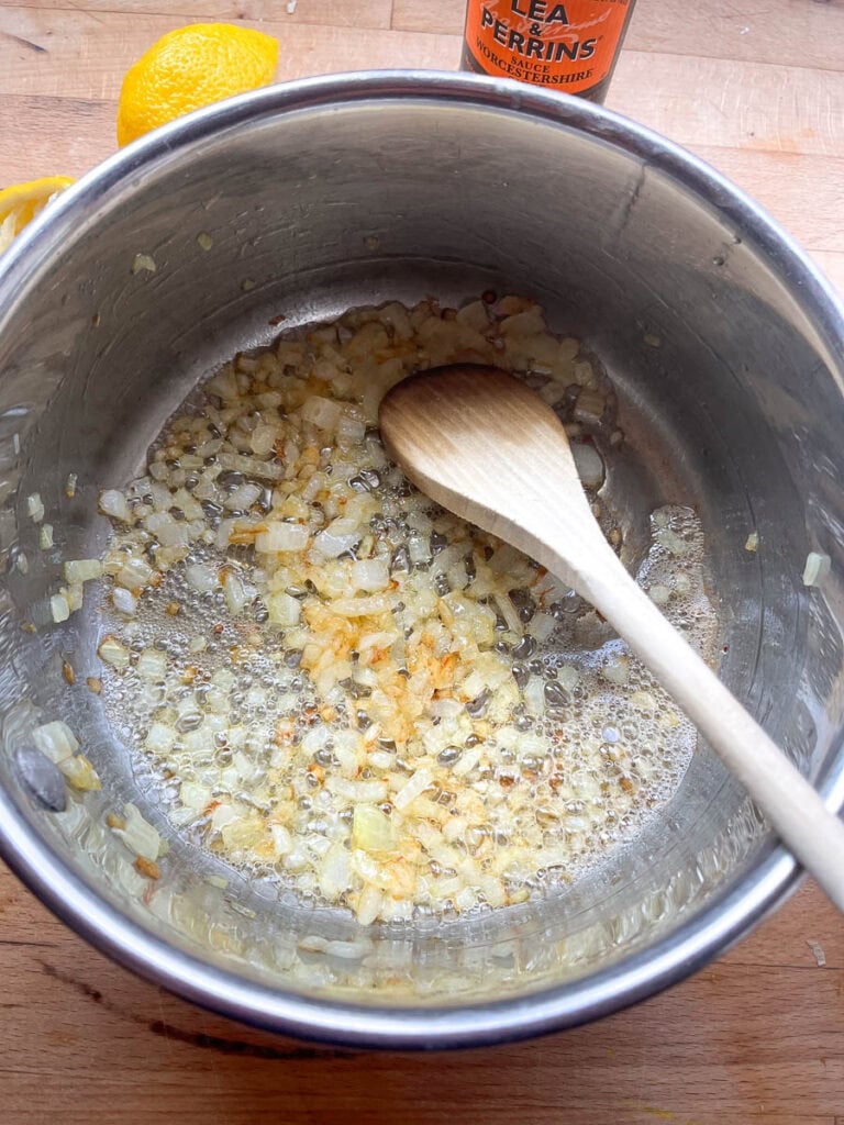 Finely chopped onions browned in butter in a saucepan.