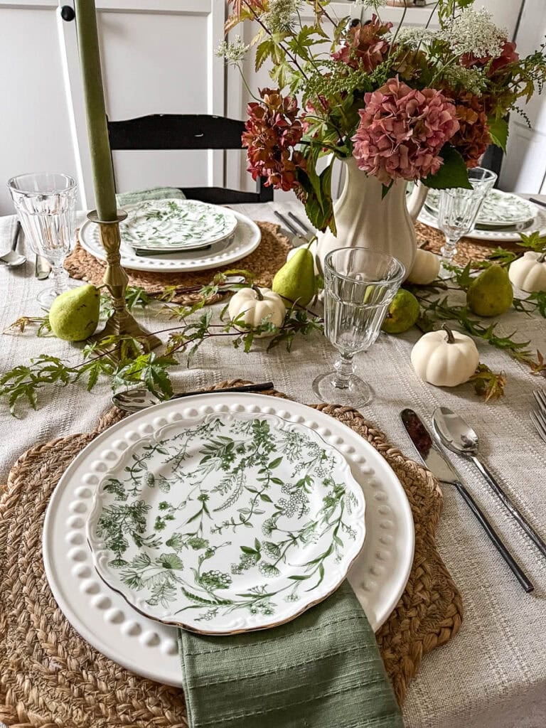 Two place settings in an English Cottage style for an autumn tablescape.