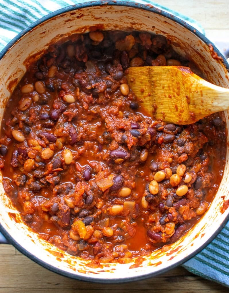 Three bean chili that has simmered in a dutch oven on the stove top for an hour.